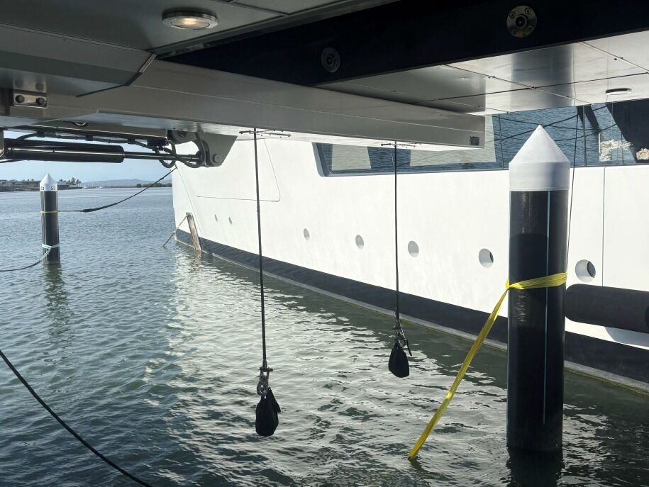 Falls and test weights hanging over the water during testing