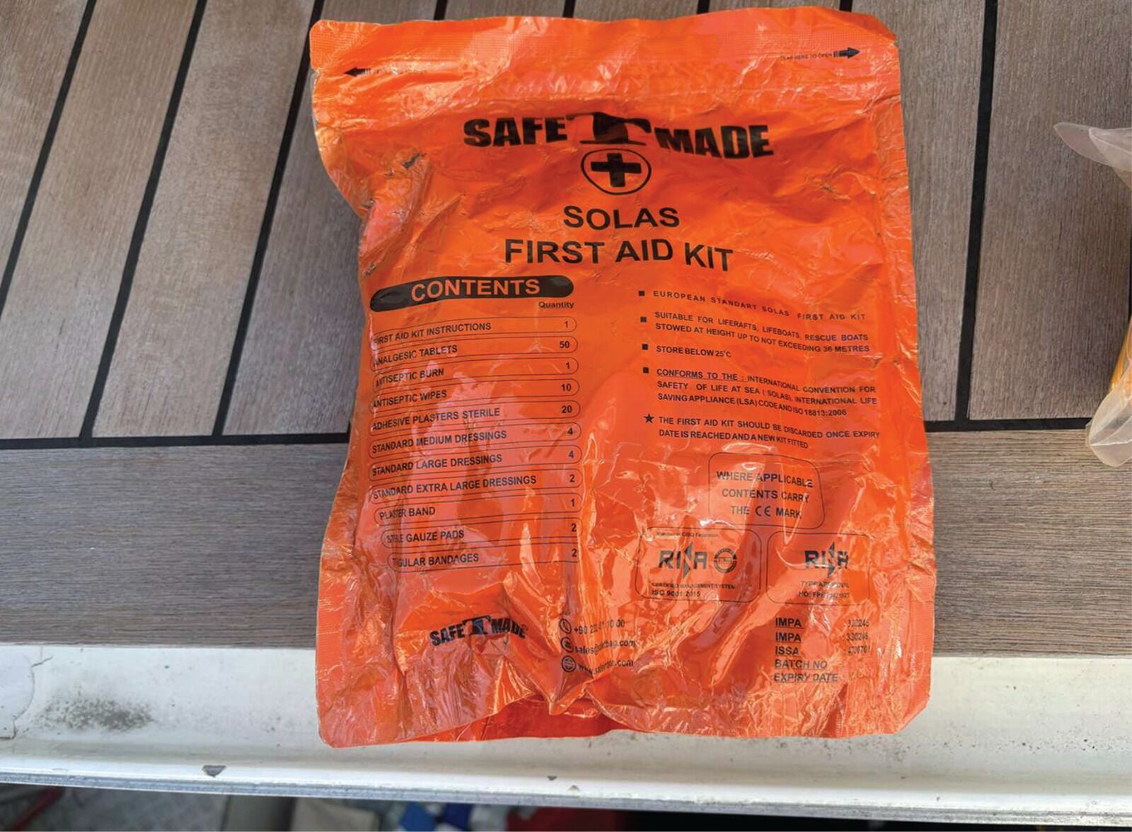 A sealed SOLAS first aid kit from the boat's equipment